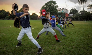 Children take part in a baseball training session