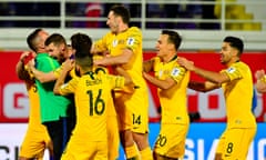 Socceroos celebrate after beating Uzbekistan in a penalty shootout. 
