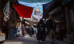 People walk through the bazaar in Murad Khani, Kabul’s old town; an area that has seen much destruction over the last decades, but that has become a center of reconstruction and restoring in the city.