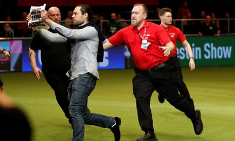 Crufts final invaded by Peta animal rights protesters – video 