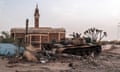 A destroyer tank lies in front of a mosque in a decimated area of Omdurman, Sudan.