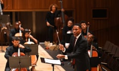 Roderick Cox conducting Chineke! Orchestra at the Royal Festival Hall.