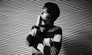 Bridget Riley in front of a piece of her Op art in May 1969.