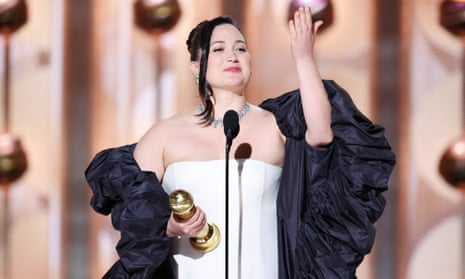 Lily Gladstone accepts her golden Globe for best performance by a female actor in a motion picture.