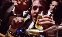 businessmen having drinks at a bar