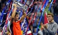 TENNIS-US-OPEN-2022<br>Spain's Carlos Alcaraz (L) celebrates with the trophy after winning against Norway's Casper Ruud during their 2022 US Open Tennis tournament men's singles final match at the USTA Billie Jean King National Tennis Center in New York, on September 11, 2022. (Photo by TIMOTHY A. CLARY / AFP) (Photo by TIMOTHY A. CLARY/AFP via Getty Images)