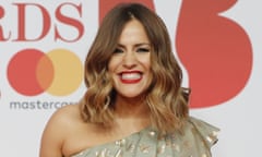 Caroline Flack poses on the red carpet on arrival for the BRIT Awards 2018