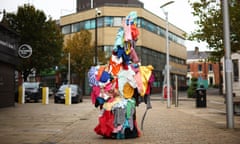 British Textile Biennial in Blackburn<br>epa10887447 Artist Jeremy Hutchison wearing a 'fast-fashion zombie' costume made of used garments from second-hand clothing markets in West Africa, walks around the town center as part of the British Textile Biennial in Blackburn, Britain, 28 September 2023. The third edition of the British Textile Biennial highlights creative works in textiles against the backdrop of the former cotton powerhouse of Lancashire. EPA/ADAM VAUGHAN