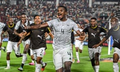 Teboho Mokoena celebrates scoring South Africa’s second goal against Morocco with his jubilant teammates on and off the pitch