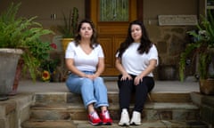 Sisters Monica and Veronica Reyes Ibarra in front of their home in the Rancho Vista community near San Marcos, Texas.