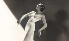 Woman wearing sheer evening gown. Courtesy of Old Visuals Everett Collection Mary Evans