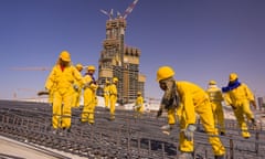 Contract labourers from Bangladesh, India, and Pakistan at a construction site in Dubai.