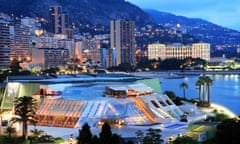 The Grimaldi Forum in Monaco at dusk.