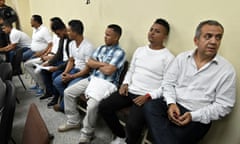 HONDURAS-CACERES-MURDER-TRIAL<br>The former manager of Desarrollos Energeticos S.A (DESA), Sergio Rodriguez (R), and the seven other people accused in the crime of Honduran environmental leader Berta Caceres, wait to hear their sentence at a courtroom in Tegucigalpa on November 29, 2018. - A Honduran court is expected to deliver judgement Thursday against eight people accused in the murder of the former coordinator of the Civil Council of Popular and Indigenous Organizations of Honduras (COPINH) Berta Caceres. (Photo by ORLANDO SIERRA / AFP)ORLANDO SIERRA/AFP/Getty Images