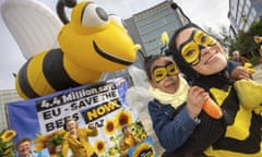 People celebrate following the EU decision for a total ban on bee-harming pesticides in Brussels, Belgium, 27 April