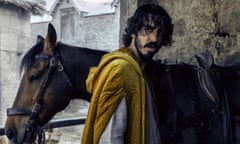 This image released by A24 shows Dev Patel in a scene from “The Green Knight.” (Eric Zachanowich/A24 Films via AP)