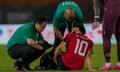 Egypt's Mohamed Salah receives medical treatment during the Africa Cup of Nations match against Egypt in Abidjan, Ivory Coast.