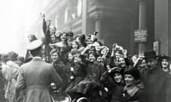 Crowds in London celebrate the Armistice at the end of the first world war, November 1918.