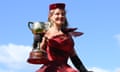 Jockey Michelle Payne holding the Melbourne Cup