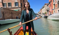 Catherine Bennett standing up in a rowing boat