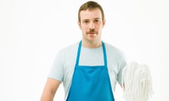 Man in apron with mop