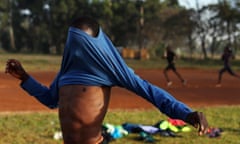 The Wider Image: Going for gold in the Great Rift Valley<br>An athlete changes after early morning training in the sports ground of the University of Eldoret, western Kenya, March 21, 2016. In Kenya's western town of Iten, known as the "Home of Champions" for drawing runners to train from around the world, athletes rise to pound the track and dirt roads at dawn. Kenyan athletics champions like marathon world record holder Dennis Kimetto and 800 metre champion David Rudisha have trained there, alongside Britain's double Olympic and world champion Mo Farah and a host of others. At 2,400 metres (7,900 feet), the altitude makes Iten an ideal location for established middle and long distance races to build their endurance and stamina. REUTERS/Siegfried Modola SEARCH "ITEN MODOLA" FOR THIS STORY. SEARCH "THE WIDER IMAGE" FOR ALL STORIES