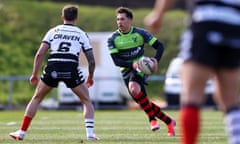 Gavin Henson of West Wales Raiders is faced up by Widnes’ Danny Craven at Stebonheath Park.