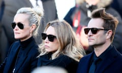 Johnny Hallyday’s wife Laeticia, left, his daughter Laura Smet, right, and son David Hallyday attending the rocker’s funeral last December.