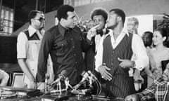 Ali Frazier King<br>FILE - In this July 17, 1975, file photo, heavyweight champion Muhammad Ali, left, points at challenger Joe Frazier at a news conference in New York City. Standing between the fighters is boxing promoter Don King. It was, Muhammad Ali would later say, the closest thing to death he had ever known. He and Joe Frazier had gone 14 brutal rounds in stifling heat off a Philippines morning before Frazier’s trainer Eddie Futch mercifully signaled things to an end, his fighter blind and battered and feeling pretty close to death himself. It was 40 years ago and the ``Thrilla in Manilla still lives in sporting lore. (AP Photo/File)