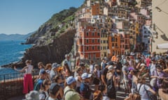 Tourists in the town of Riomaggiore.