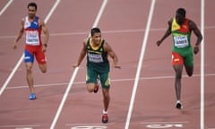 (L-R) Dominican Republic's Luguelin Santos, South Africa's Wayde Van Niekerk and Grenada's Kirani James compete in the final of the men's 400 metres athletics event at the 2015 IAAF World Championships at the "Bird's Nest" National Stadium in Beijing on August 26, 2015.  AFP PHOTO / PEDRO UGARTEPEDRO UGARTE/AFP/Getty Images