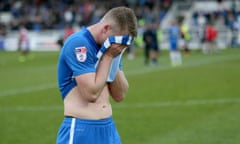 Hartlepool defender Scott Harrison is in tears at the final whistle after the north-east club slipped out of the Football League despite beating Doncaster Rovers 2-1