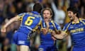 Daniel Mortimer celebrates a try with Eels teammates Todd Lowrie and Nathan Hindmarsh during Parramatta’s 48-6 win over Penrith in round 25 of the 2009 season.