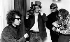 Photo of Bob Dylan<br>Tour of Britain, 1966: Bob Dylan with D.A. Pennebaker in the background filming the documentary Don't Look Back. Photo by Michael Ochs Archives/Getty Images