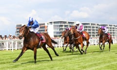 Mustashry, ridden by Jim Crowley, goes clear to win the  Lockinge Stakes
