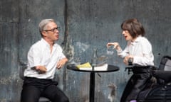 Mat Fraser and Liz Carr, both dressed in white and black, hold a discussion