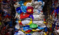 Discarded plastic bottles made of high density polyethylene waiting to be recycled