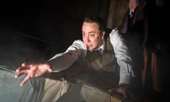 A model of suspense … Matthew Spencer as The Actor with Julian Forsyth as Arthur Kipps behind in The Woman in Black at the Fortune theatre, London.