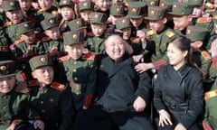 NKOREA-POLITICS-KIM<br>This March 2, 2017 picture released by North Korean news agency, KCNA (Korean Central News Agency) on March 3, 2017 shows North Korean leader Kim Jong-Un (C) and his wife Ri Sol-Ju (front 2nd R) visiting the Mangyongdae Revolutionary School in Pyongyang to plant trees with its students on the Tree-planting Day. CAMPAIGNS - DISTRIBUTED AS A SERVICE TO CLIENTS        (Photo credit should read STR/AFP/Getty Images)