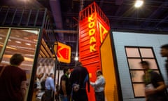 People walk near the Kodak exhibit at CES in Las Vegas, Nevada, January 10, 2018. / AFP PHOTO / DAVID MCNEWDAVID MCNEW/AFP/Getty Images