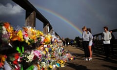 Floral tributes to the victims of the airshow crash left on the Old Tollbridge near the A27 at Shoreham in West Sussex