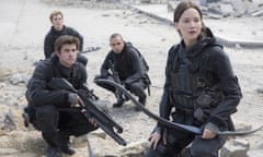 Jennifer Lawrence Liam Hemsworth Sam Clafin Evan Ross<br>This photo provided by Lionsgate shows, Liam Hemsworth, left, as Gale Hawthorne, Sam Clafin, back left, as Finnick Odair, Evan Ross, back right, as Messalia, and Jennifer Lawrence, right, as Katniss Everdeen, in the film, "The Hunger Games: Mockingjay - Part 2."  The movie opens in U.S. theaters on Nov. 20, 2015. (Murray Close/Lionsgate via AP)