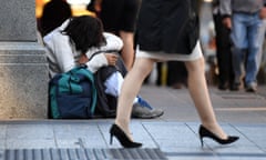 Woman sitting in CBD street