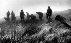 Police searching Saddleworth Moor for further victims of the Moors murders in 1986.