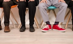 Four business men waiting for an interview<br>EW7YYK Four business men waiting for an interview