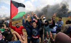 Palestinians clash with troops during a protest along the Israel border with Gaza