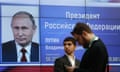 Men stand in front of a screen showing preliminary results of Russian President Putin in the presidential election, at the headquarters of Russia's Central Election Commission in Moscow<br>Men stand in front of a screen showing preliminary results of Russian President Vladimir Putin in the presidential election, at the headquarters of Russia's Central Election Commission in Moscow, Russia March 19, 2018. REUTERS/Sergei Karpukhin