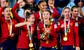 Spain's Olga Carmona and teammates with the Women's World Cup trophy