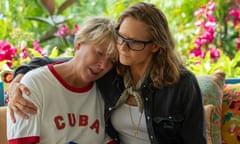 Annette Bening as Diana Nyad, wearing a Cuba t-shirt, crying on the shoulder of Jodie Foster as Bonnie Stoll, in the film Nyad