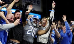 Jahmyr Gibbs celebrates his touchdown with Detroit Lions fans during their Monday Night Football win over the Las Vegas Raiders